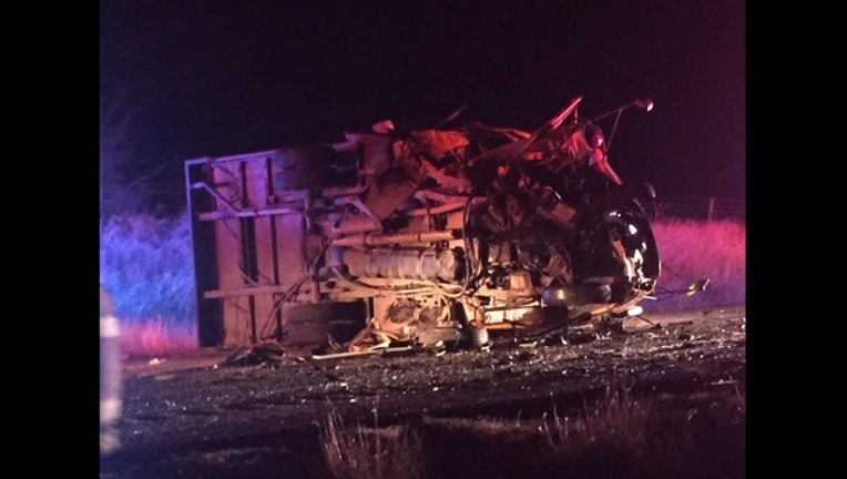 3e88d366-Bus flipped on side in Parker County on December 1 following crash involving car_1543763056676.jpg.jpg