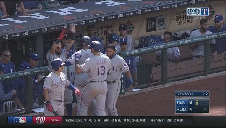 3f3d79d1-Rangers Beat Astros_1493939616603.jpg