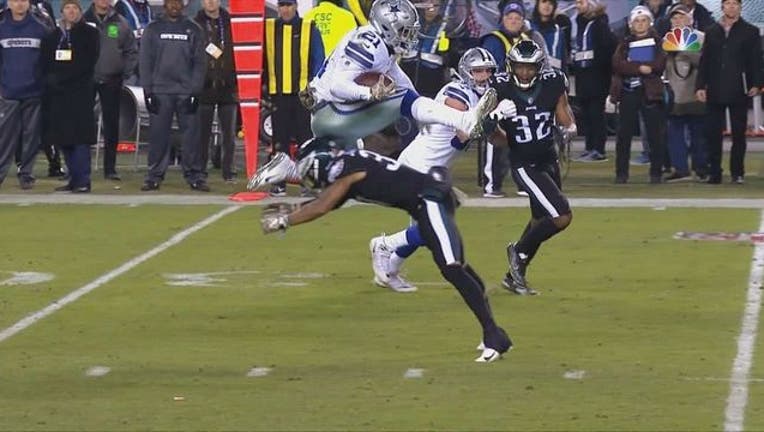 Ezekiel Elliott hurdle_1541997955124.jpg