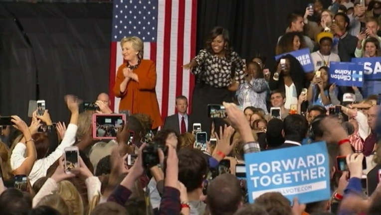 45bc6899-michelle obama hillary clinton rally