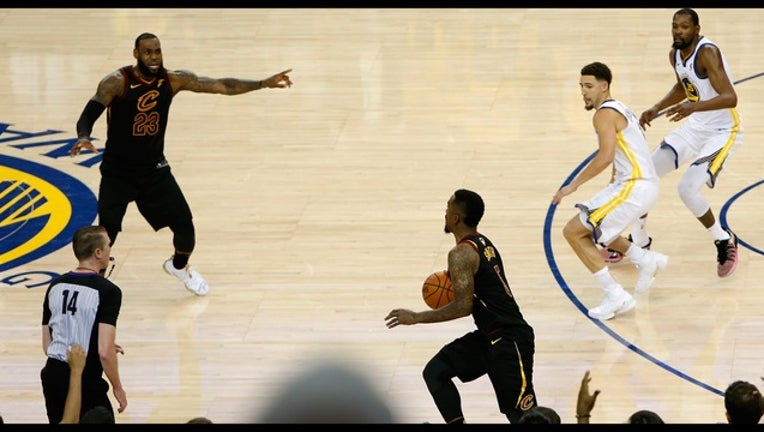 491da124-Cavaliers vs Warriors_1527893418831