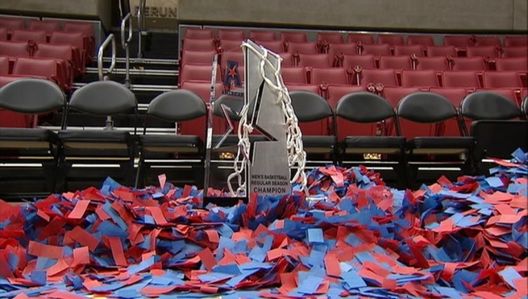 4b40030e-SMU basketball championship trophy AAC