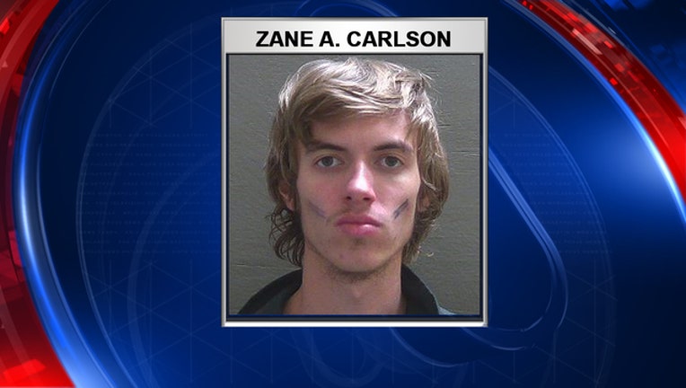 57001b78-Zane Alexander Carlson-pensacola-airport-arrest_1548970785932.jpg-402429.jpg