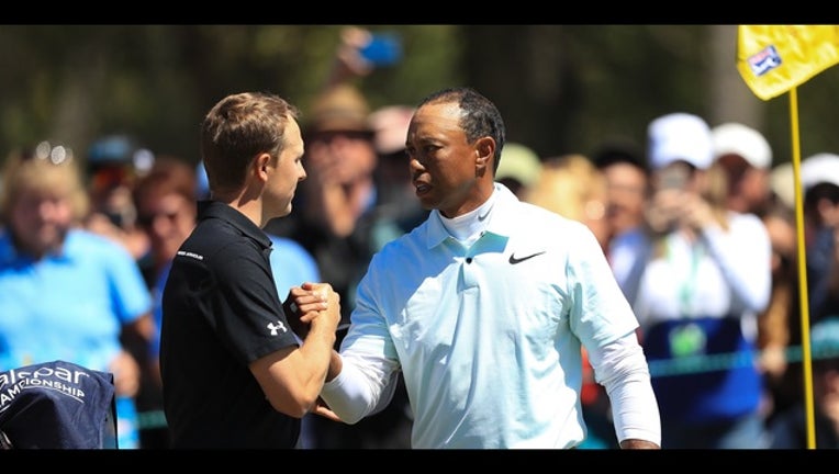 58b0248e-Tiger Woods and Jordan Spieth_1520640846082