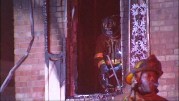 59c67ba2-Woman found dead after firefighters put on Dallas house fire_1543768281643.jpg.jpg