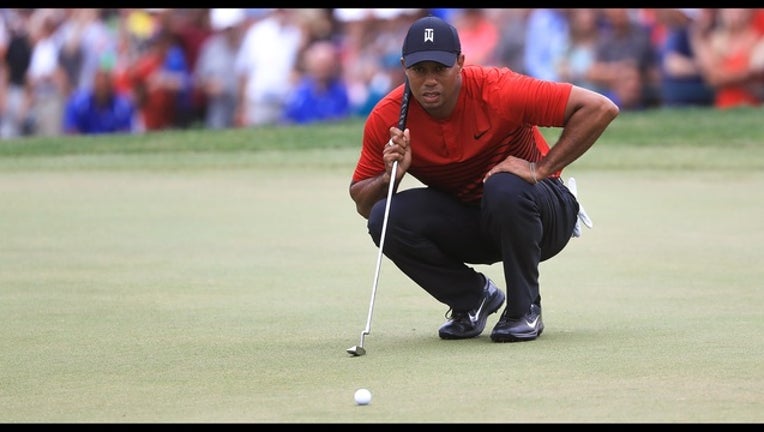 72c28f59-Tiger Woods_1520815852019