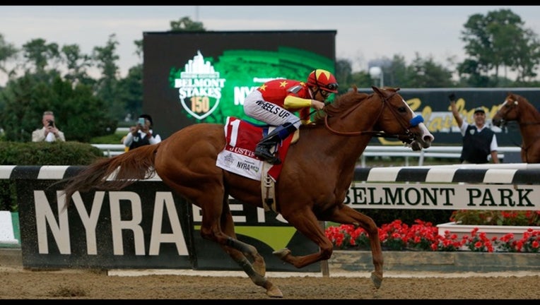 7786b83d-Justify wins Belmont Stakes_1528585745723