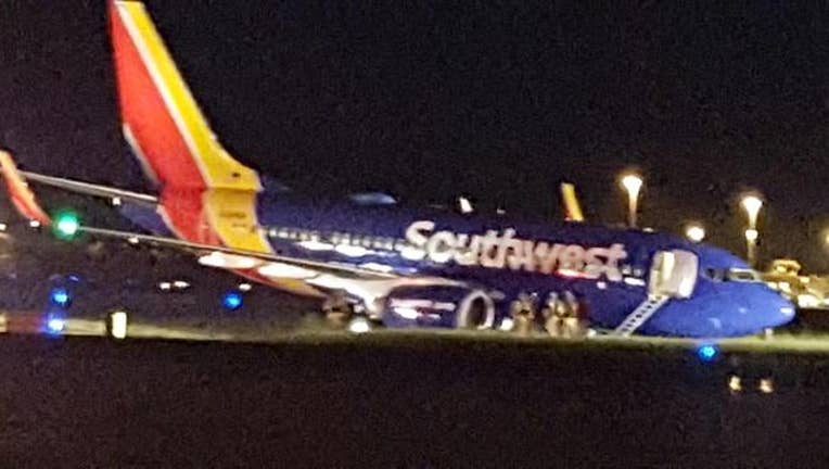 81c37ff4-Southwest plane off runway