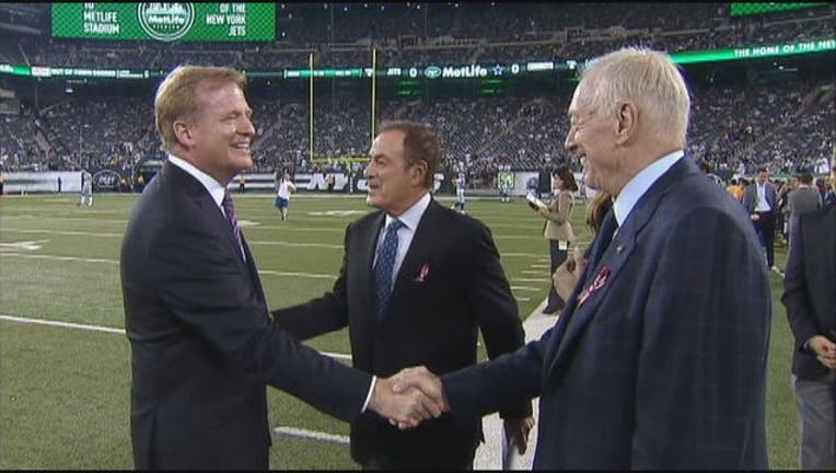 Goodell Jerry Jones_1510255476393.jpg