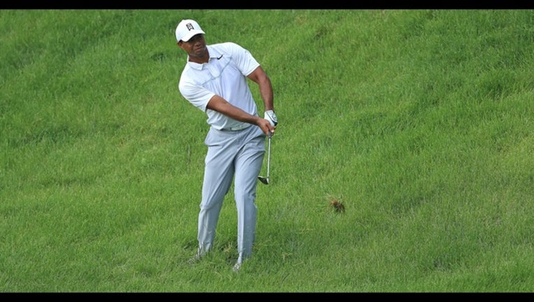 8ac10c42-Tiger Woods_1527820056597