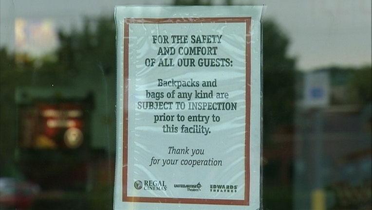 903887af-Movie theater security sign