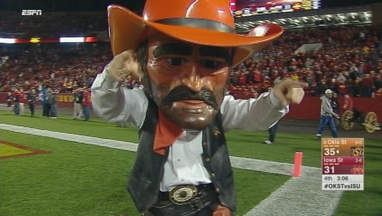 9e3bda59-Oklahoma State Beats Iowa S_1447551109873.jpg