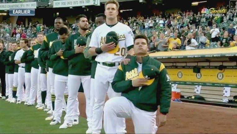 a1bfc9b5-Bruce maxwell kneel 9-23_1506227524581.jpg