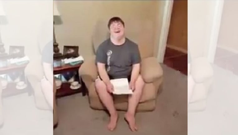 a2c9f155-boy_down_syndrome_accepted_college_050917_1494348602164-401096.jpg