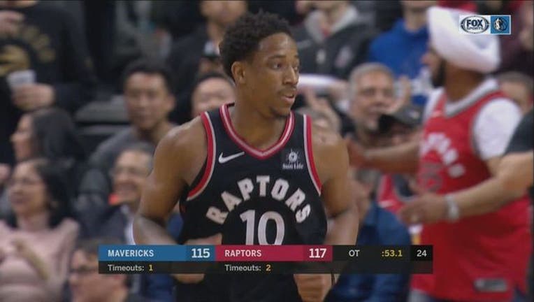 a8119af0-Mavs vs. Raptors_1521255475622.jpg