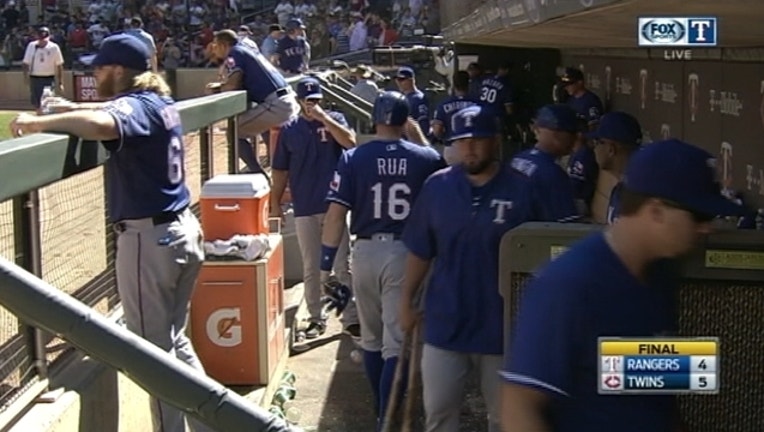 ad61a53e-Rangers Lose Series Twins_1467581745382.jpg