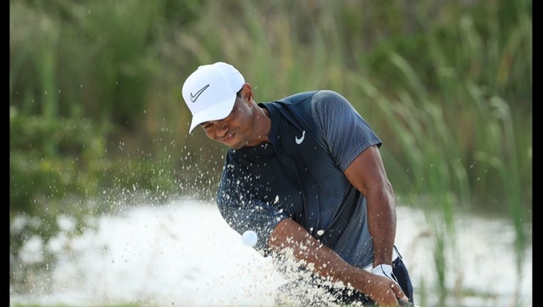 ae962829-Tiger Woods_1512258613090