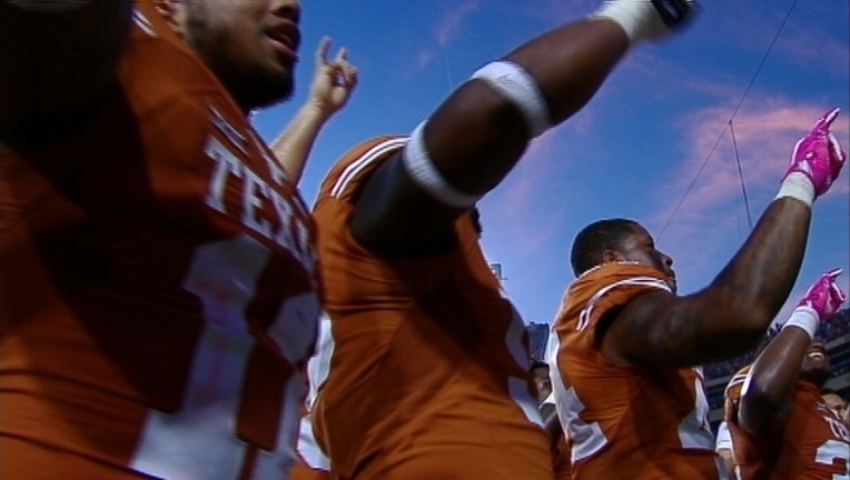 bb61a731-TEXAS CELEBRATES WIN_1477793176127.jpg