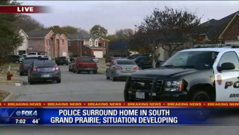 bfcd4700-Grand Prairie Police Surround Home on Autumn Hill near Carrier Parkway_1543078663430.jpg.jpg