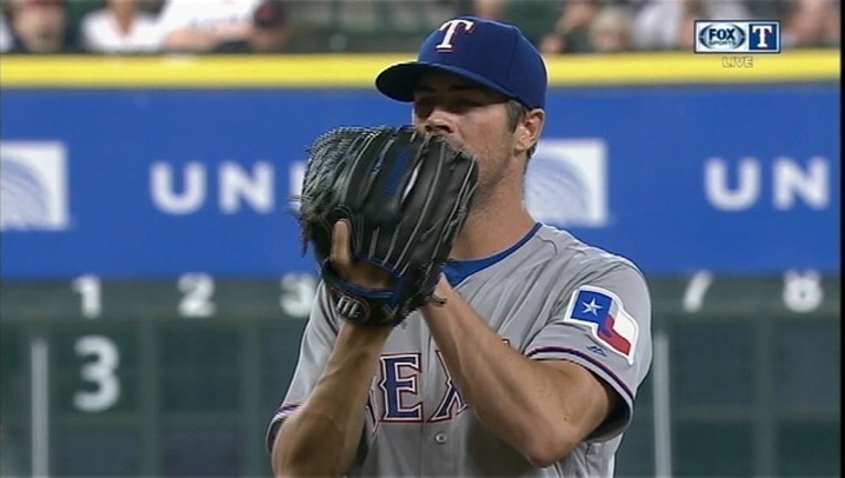 Cole Hamels Astros_1463952875679.jpg