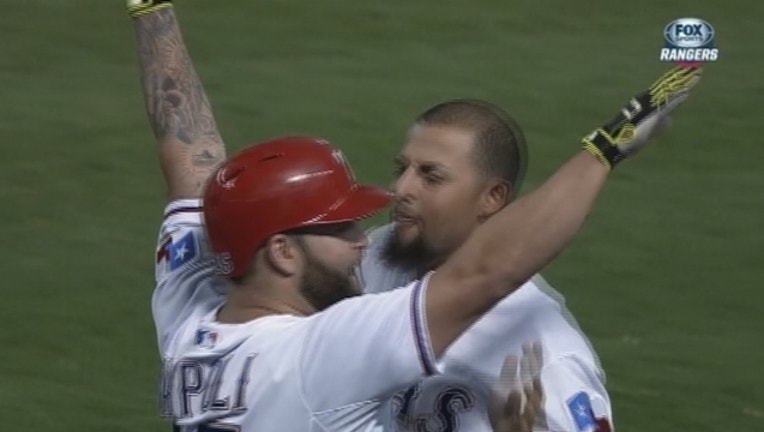 d07e442d-Mike Napoli Rangers Win_1443670786518.jpg