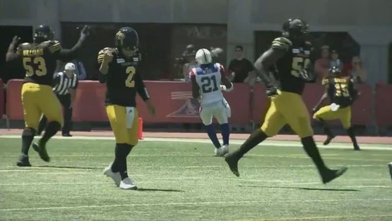 Manziel CFL TD pass_1528584063424.jpg