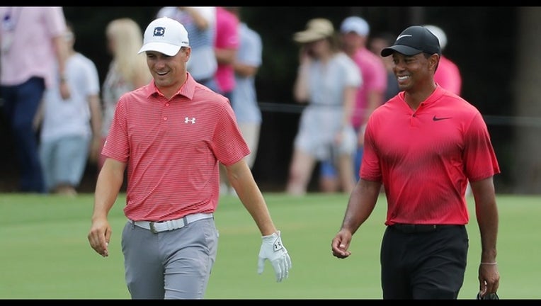 dea33a56-Jordan Spieth and Tiger Woods_1526259600147