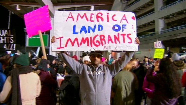 e089a661-immigration protest travel ban trump