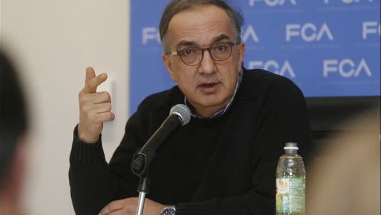 e221ad51-sergio-marchionne-fca-logo_1532513021288-65880.jpg