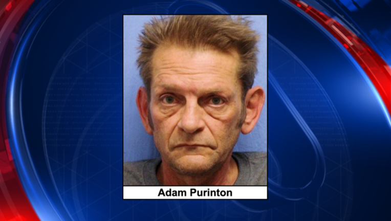 ee23d402-Adam Purinton mugshot_1487974156096.png