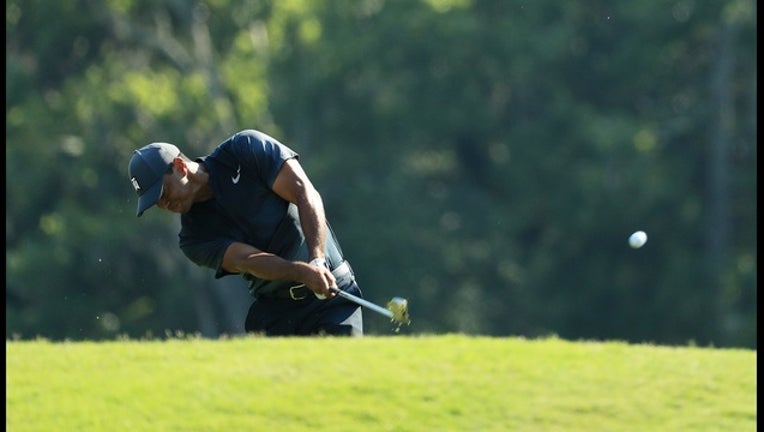 ef6c96b3-Tiger Woods_1526090036391