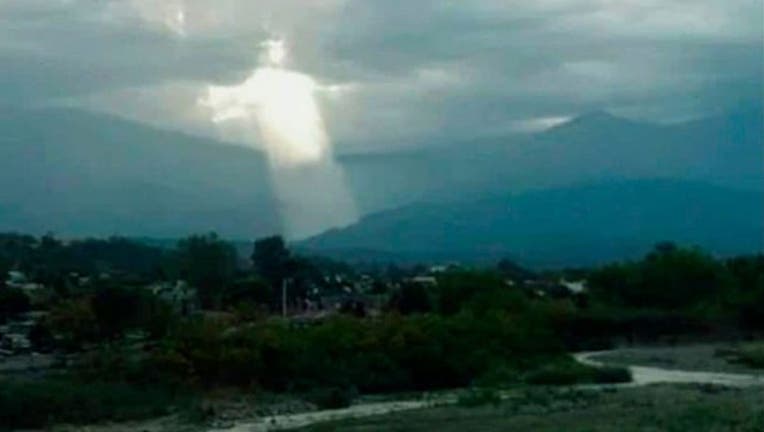 Image Of Jesus Shining Through The Clouds Goes Viral