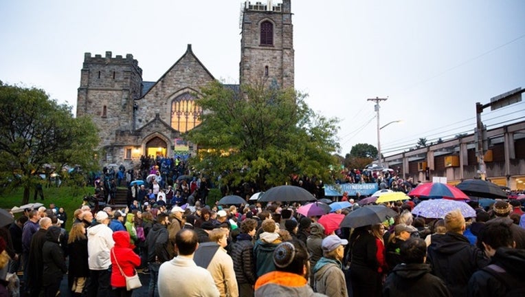 f7c2adf4-pittsburgh_synagogue_shooting_vigil_02_102818_1540748244549-401096-401096-401096.jpg