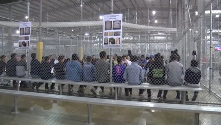 fcf0fdf2-P-IMMIGRANT ENFORCEMENT REUNIONS 530P_00.00.33.26_1531262566097.png.jpg