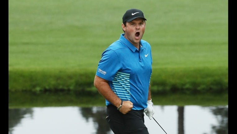 ff3f373a-Patrick Reed_1523145448043