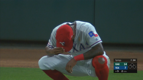 Davis hits 2 HRs, A's top Rangers 14-9, keep wild-card lead