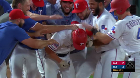 Rookies push Rangers to 3-2 win for split of DH with Angels