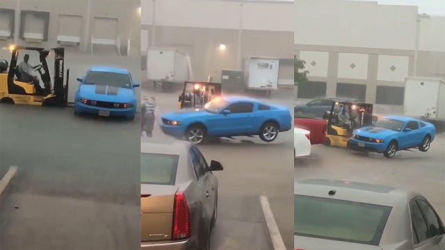 Quick-thinking coworker saves man's car from Imelda flood with forklift