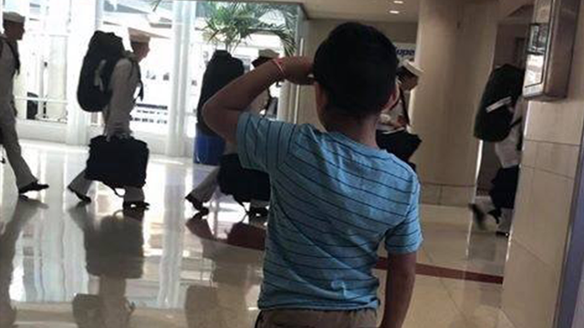 'They protect us, Daddy': Photo of 6-year-old saluting sailors goes viral