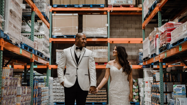 Couple takes epic wedding photos in Costco aisle where they first met
