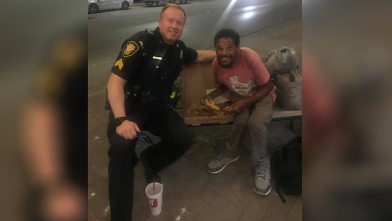 0d765a11-FW officer shares meal with homeless man_1564417073075.jpg.jpg