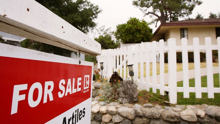 For Sale sign house GETTY