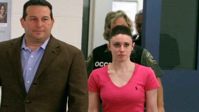 Attorney Jose Baez escorts Casey Anthony as she leaves the Orange County Corrections Facility on July 17, 2011, in Orlando, Fla. (Red Huber/Orlando Sentinel/MCT)