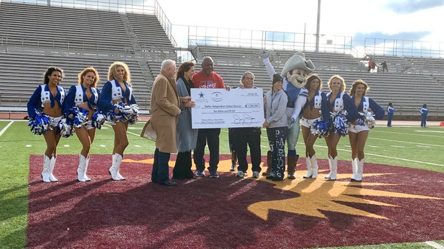 Jerry Jones surprises high school team with $1 million check to rebuild field