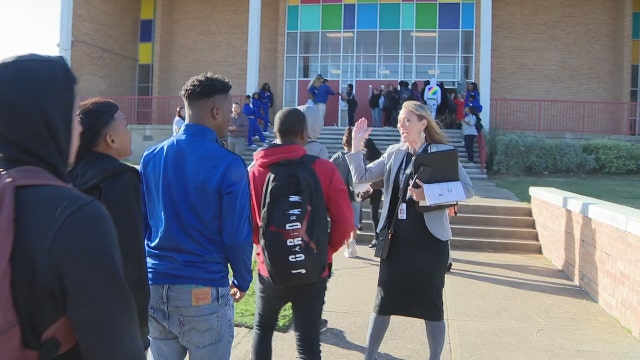 Thomas Jefferson High School staff helping students transition to new campus