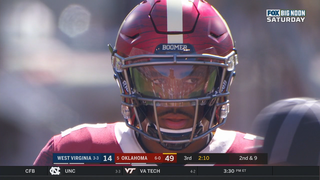 Hurts scores 5 TDs, Sooners roll past West Virginia 52-14