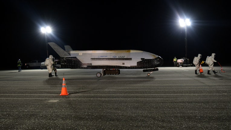 57708a8c-The X-37B on the runway at Kennedy Space Center after landing (USAF photo)