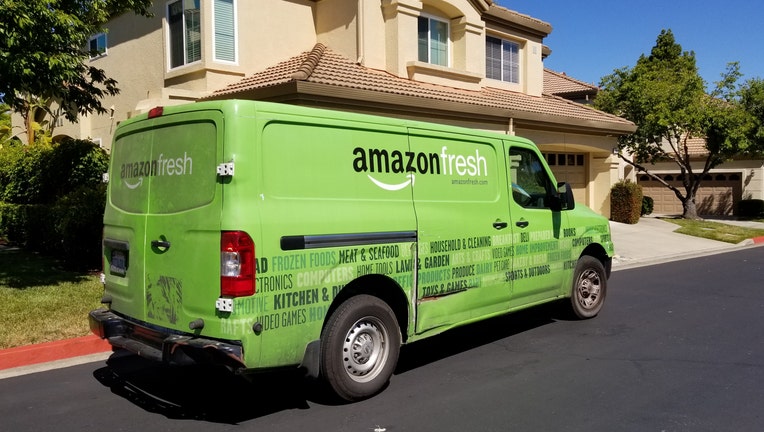Amazon Fresh grocery delivery truck from the Amazon Prime service parked on a suburban street in San Ramon, California, July 5, 2018. (Photo by Smith Collection/Gado/Getty Images)