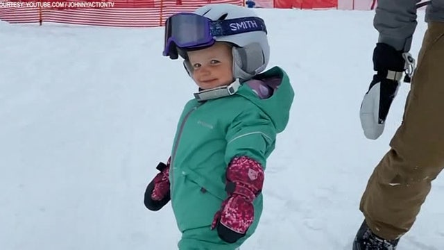 Baby shreds snow on Utah ski slopes