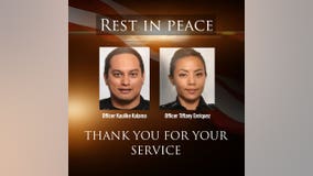 Shooting kills 2 officers before Hawaii homes catch fire